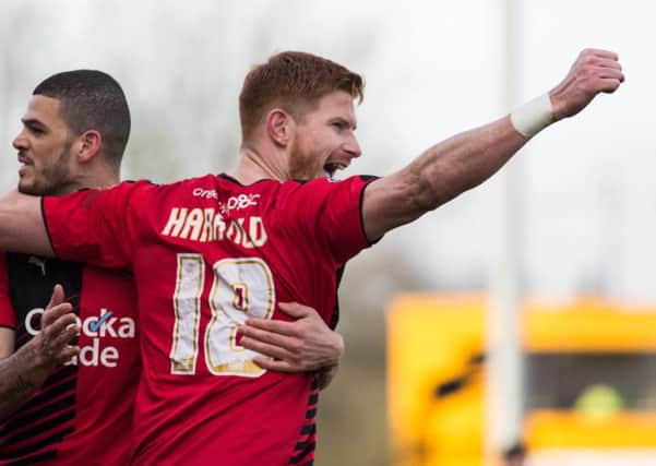 Matt Harrold celebrates scoring for Crawley Town during their 1-1 draw with Morecambe. Picture by Jack Beard SUS-160503-194457002