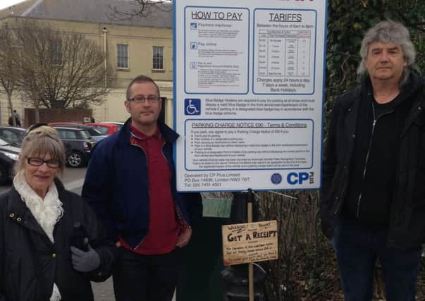 Picketers in the Montague Centre car park