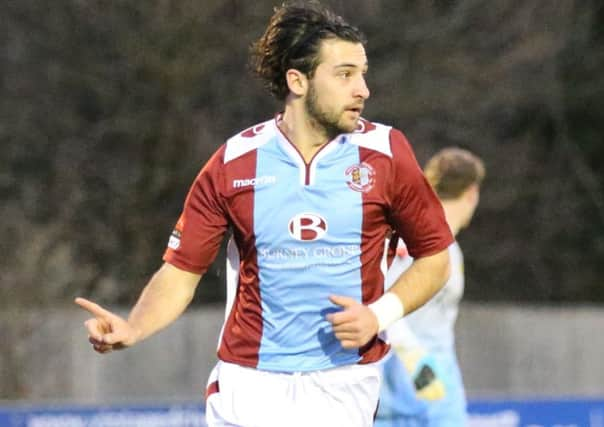 Billy Medlock scored two goals before being carried off in Hastings United's 4-2 win at home to Molesey. Picture courtesy Scott White