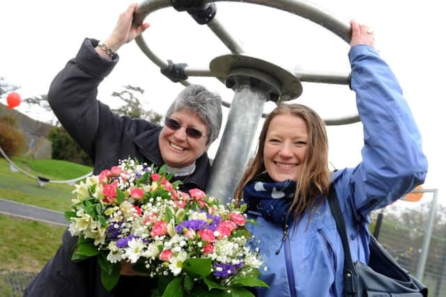 Slinfold Parish Council spend Â£30,000 on rejuvenating play field at Grattons, Slinfold. Rev, Sandra Hall and Miss Laura Phibbs (Headteacher Slinfold Cof E Primary) try out the new facilities. Pic Steve Robards SR1610633 SUS-160418-130304001