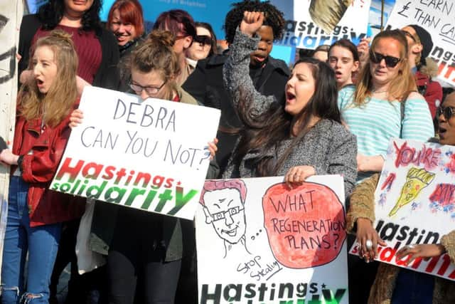 Demonstration outside University of Brighton in Hastings. SUS-160317-144615001