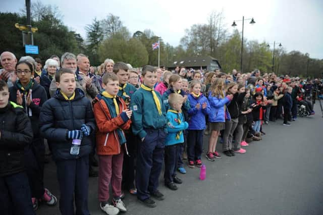 People gather in Tilgate Park, Crawley, (Thursday April 21) for the lighting of the beacon to mark The Queens 90th birthday. SUS-160422-152111001