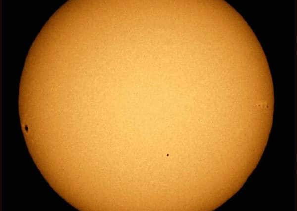 Mercury transiting the Sun