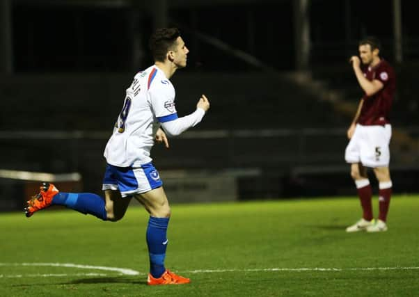 Conor Chaplin celebrates his goal at Sixfields in December. Picture: Joe Pepler