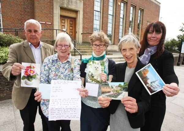 DM16116595a.jpg Campaigners launch postcard writing bonanza ina bid to save Chichester Law Courts. Photo by Derek Martin SUS-160905-175730008