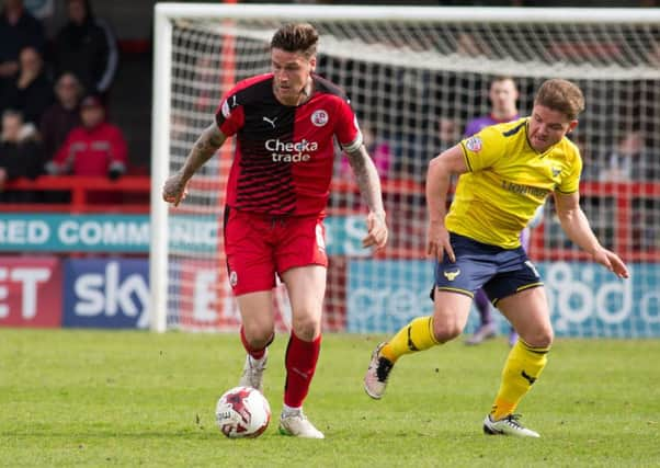 Sonny Bradley wins the ball for Crawley Town against Oxford United, 9th April 2016. (c) Jack Beard SUS-160904-183836008