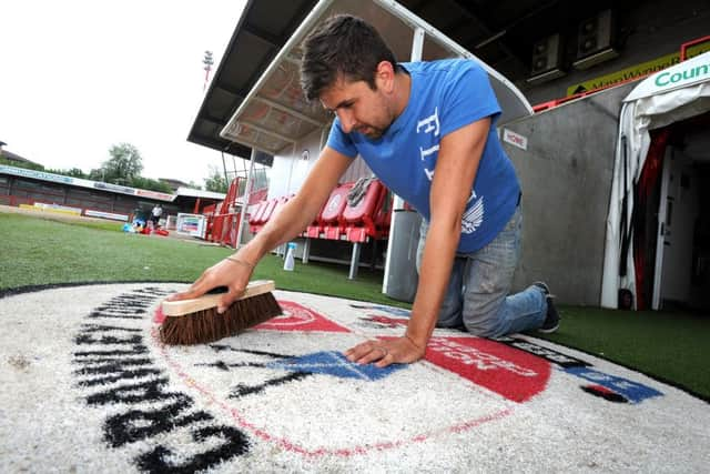 Crawley Town operation clean up giving fans a chance to clean the stadium. Dan Charman (Drawley Town Supporter Alliance Board Member) Pic Steve Robards  SR1614437 SUS-160523-115003001