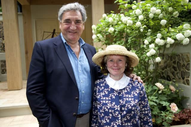 Actors Jim Carter and wife Imelda Staunton at the silver-award-winning Chelsea Flower Show garden. Photo by  Shuvaseesh Das SUS-160525-133957001