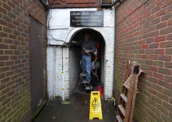 Picture shows BLAPG volunteers hard at work, cleaning and painting