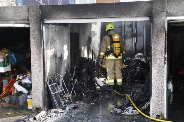 Fire crews deal with a garage fire in Worthing. Picture: Eddie Mitchell