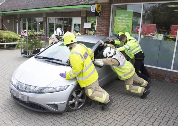 CAR INTO LANCING ASDA. Photo by Eddie Mitchell.