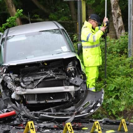 Two cars crashed head-on on the A21. Photo by Dan Jessup