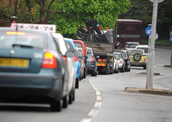 Traffic tailbacks at Stonepound crossroads Hassocks ENGSUS00120120424120547