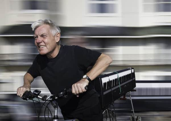 Musician Mike Hatchard who plans to ride from Lands End John oGroats with his electric piano strapped to a trailer. SUS-160614-110940001