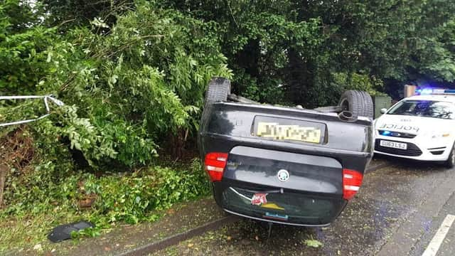 A car ended up on its roof after and accident in Newick. Photo by Nick Fontana. SUS-160623-190839001