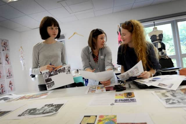 Award-winning designer Ele Slade (centre) working with students at Rye Studio School. SUS-160627-152128001