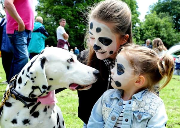 Chloe Rance, 12, her sister Grace, two, and their dog Darli. Pictures: Kate Shemilt ks16000802-5