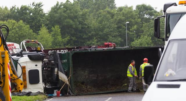 A driver escaped without serious injures after their lorry overturned near East Hoathly last night. Pictures by Nick Fontana SUS-160630-135129001