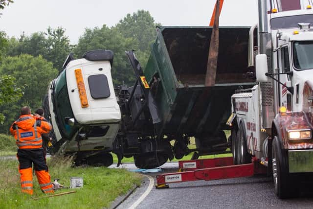 A driver escaped without serious injures after their lorry overturned near East Hoathly last night. Pictures by Nick Fontana SUS-160630-135110001