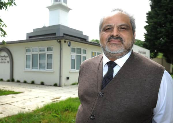 Regional president Ahsan Ahmedi outside the Noor Mosque