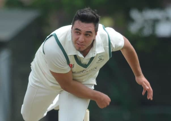 Eastbourne CC V Lindfield CC-7-5-16- Lindfield's Tem Hodson bowling (Photo by Jon Rigby) SUS-160905-105705008