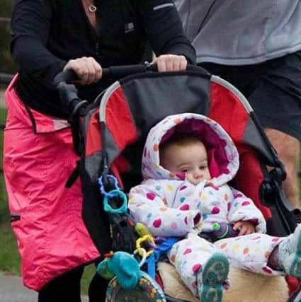 Sonia Latham has been nicknamed Ironmum by friends, as she often pushes her daughter Evie around while training