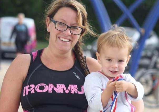 'Ironmum' Sonia Latham with daughter Evie