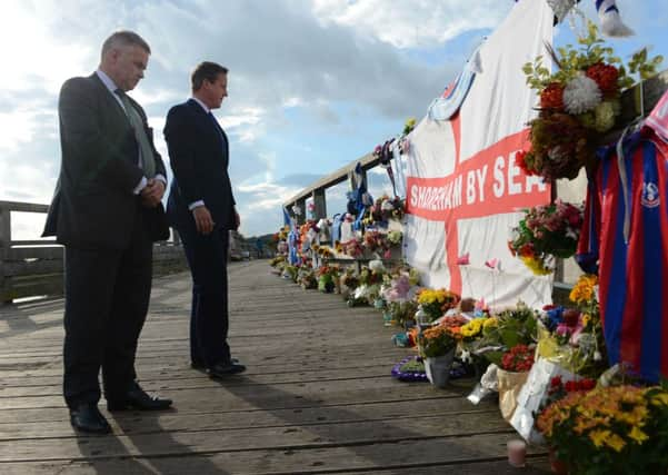 Prime Minister David Cameron with local MP Tim Loughton at the Old Toll Bridge, Shoreham