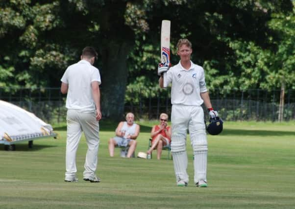 Jordan Silk celebrates his century