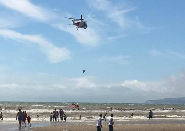 The Coastguard helicopter at Camber Sands. Photo by Jo O'brien-Passfield SUS-160724-173739001