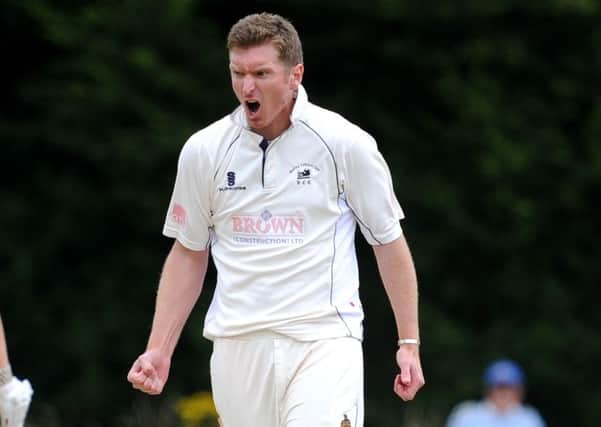 Cricket: Sussex League Premier Division: East Grinstead (batting) v Roffey. Leigh Harrison takes the wicket of Will Adkin . Pic Steve Robards  SR1623326 SUS-160108-122142001