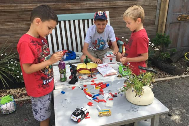 Children playing with Lego