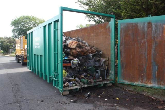 Rother District Council officers cleared piles of rubbish and debris from the front garden of Anthony Hamiltons home in Southcourt Avenue, Bexhill. SUS-160908-130305001