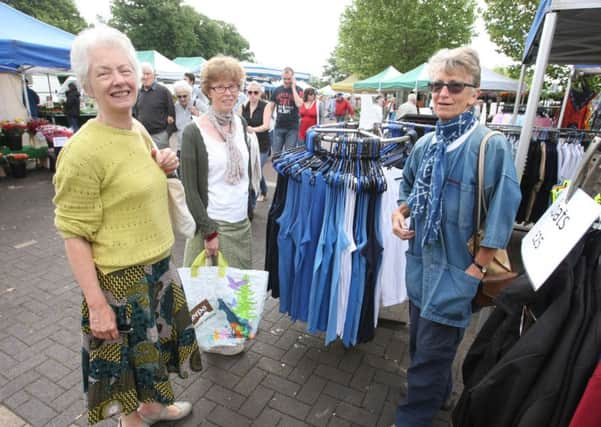 Shoppers at the current cattlemarket market