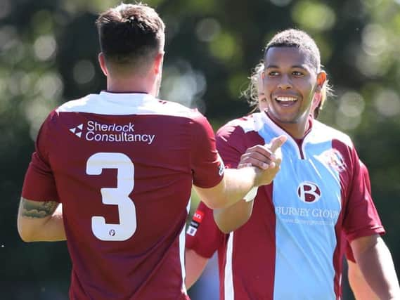 Hastings United striker Jack Harris celebrates with Sam Cole after scoring in last weekend's pre-season friendly against Havant & Waterlooville. Picture courtesy Scott White