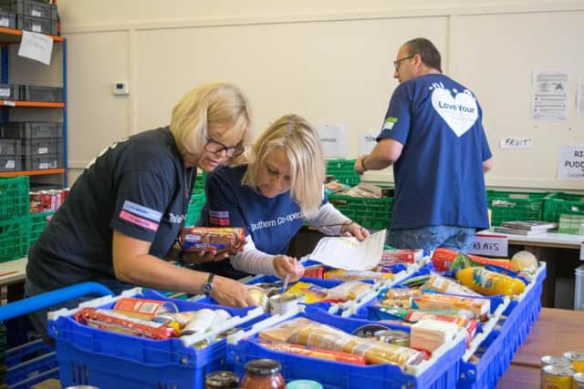 The Southern Co-operatives leadership colleagues volunteering at the Chichester Trussell Trust Food Banks warehouse