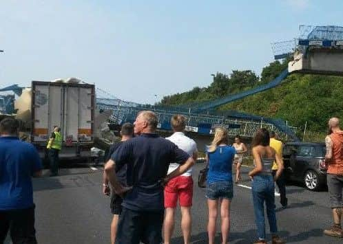 The scene on the M20 between Borough Green and Leybourne in Kent after a lorry hit a foot bridge and it collapsed. Picture: @emmaraphaelx / SWNS.com