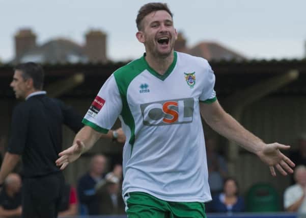 James Crane celebrates scoring for the Rocks against Guildford / Picture by Tommy McMillan