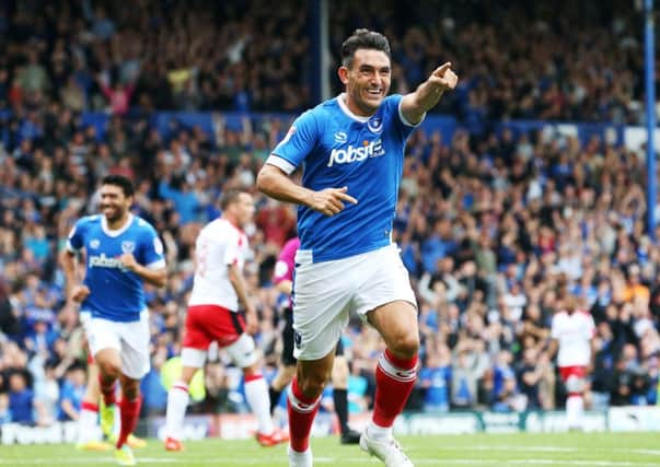 Gary Roberts celebrates his goal as Pompey crushed Crawley. Picture: Joe Pepler