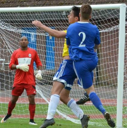 Jamie Weston on defensive duties. Haywards Heath Town v Broadbridge Heath. Picture by Grahame Lehkyj