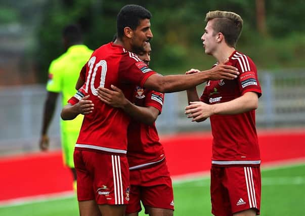 Worthing celebrate Omar Bugiel's first goal on Saturday. Picture by Stephen Goodger