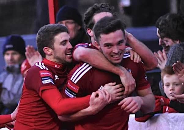 Lloyd Dawes celebrates a goal with Worthing last season