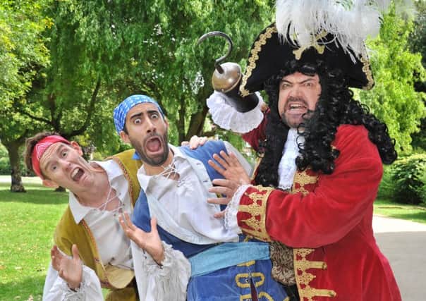 Joseph Elliott (pirate) with Richard David-Caine (pirate) and Shaun Williamson (Captain Hook). Picture Paul Clapp