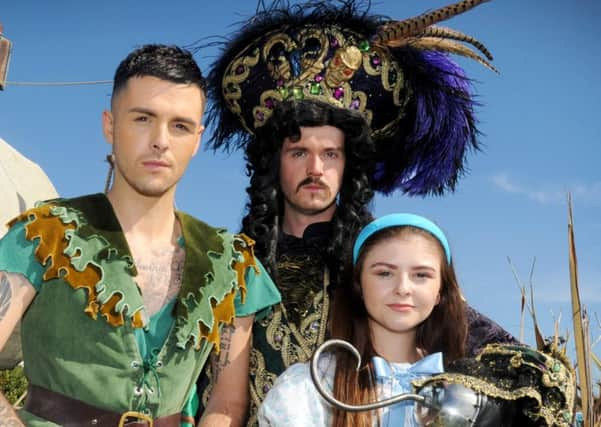 Jaymi Hensley (Peter Pan) , Sean Chambers (Captain Hook) and Nina Bell (Wendy). SUS-161209-152019001