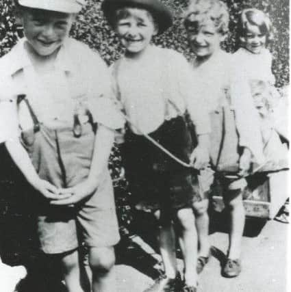 One display at the exhibition will ask visitors to name the children in old school photos