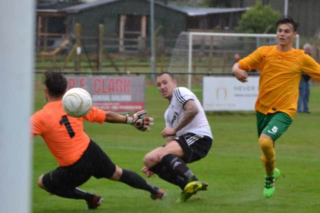 Gordon Cuddington scores Bexhill's second goal. Picture courtesy Alan Coomes