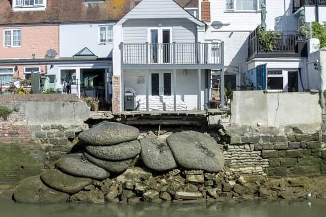 The extent of the damage to Johnny Boylan and Belinda Pickering's flood wall SUS-160914-172955001