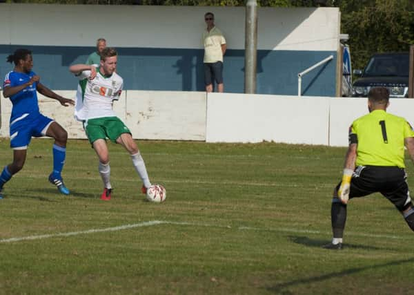 Jimmy Wild tries his luck on Billericay's pitch in the earlier league visit / Picture by Tommy McMillan