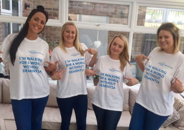 Bernie, 26, Becky, 27, Emily, 27 and Hannah, 28, are taking part in the Brighton Memory Walk to raise awareness of the disease