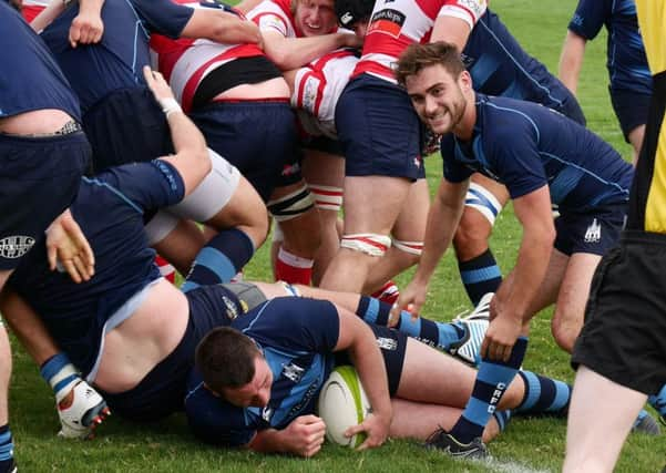 Jon Lindsay dots down for Chi at Dorking and Henry Ansvombe looks impressed / Picture by Tony Elkin